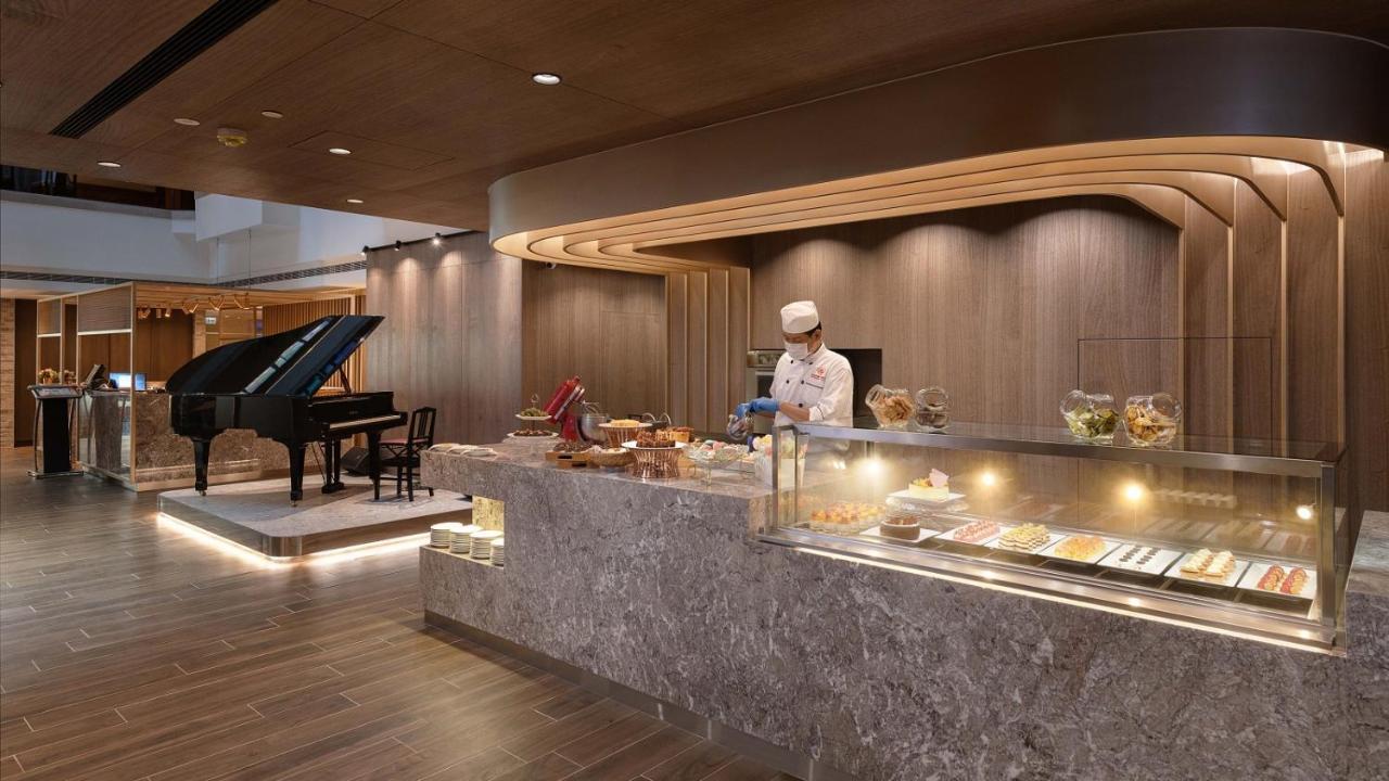 The Howard Plaza Hotel Καοσιούνγκ Εξωτερικό φωτογραφία The Wing at Hong Kong International Airport